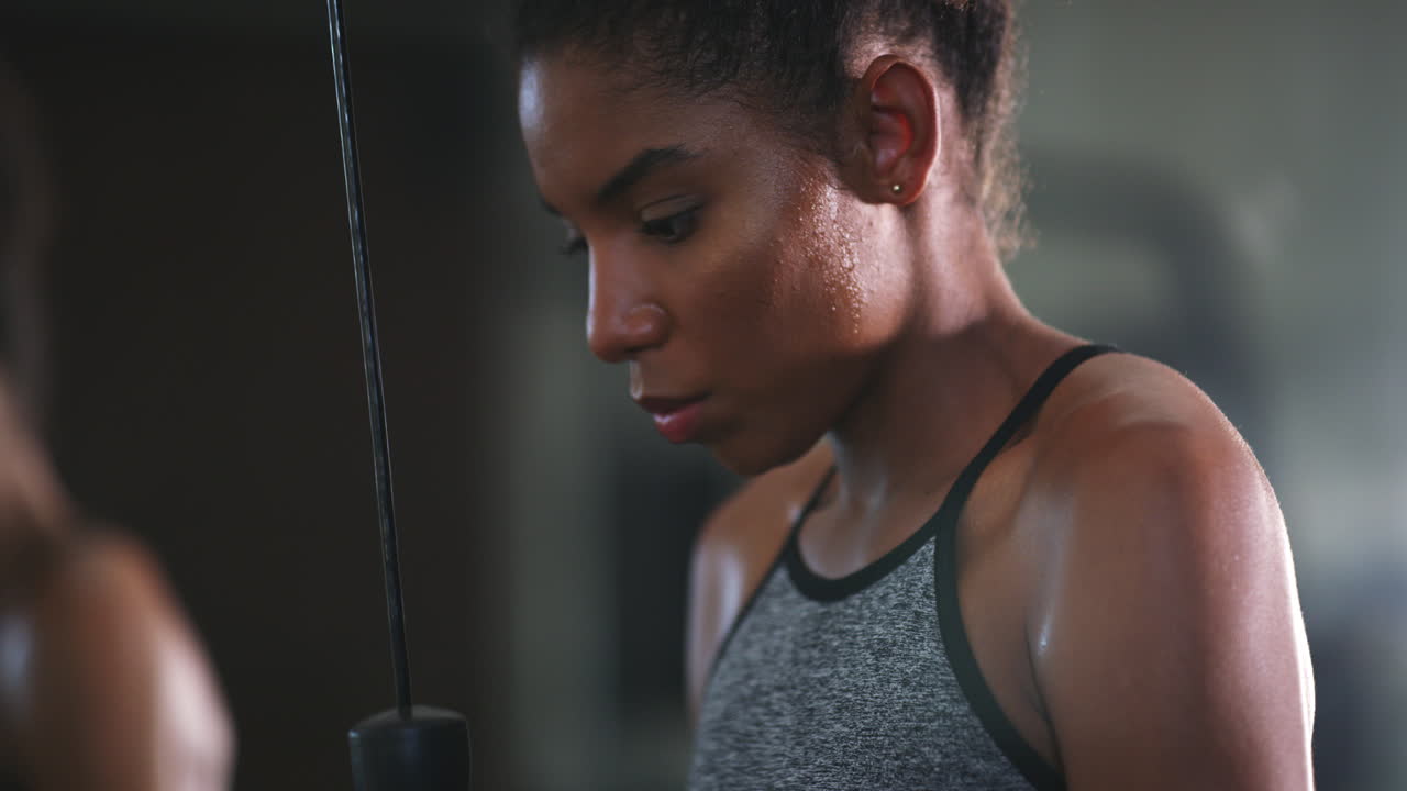 4k video footage of young working out at the gym