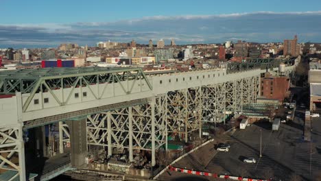 aerial footage of the elevated train tracks of the culver overpass at 9th street in brooklyn new york city