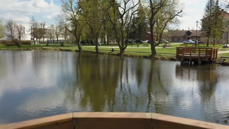 aerial of catwalk on pond in urban park