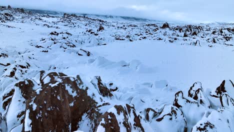 snow covered boulders in the alabama hills, california