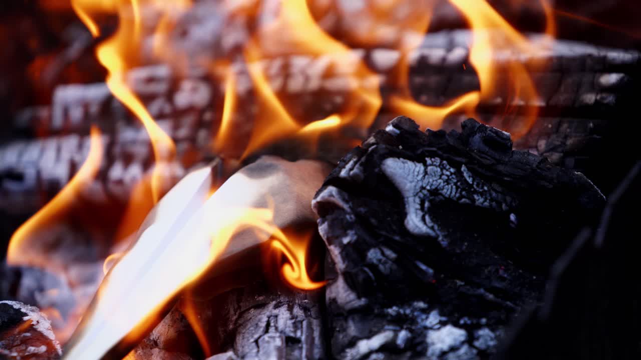 Fire wood burning. Detailed close up of warm fire