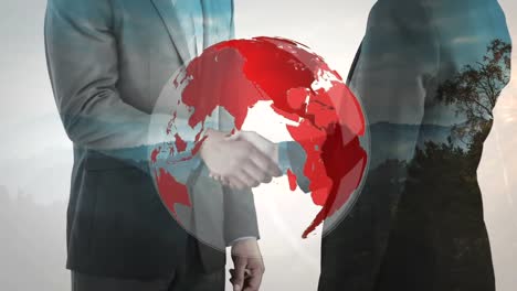 Animation-of-globe-over-businessman-handshake