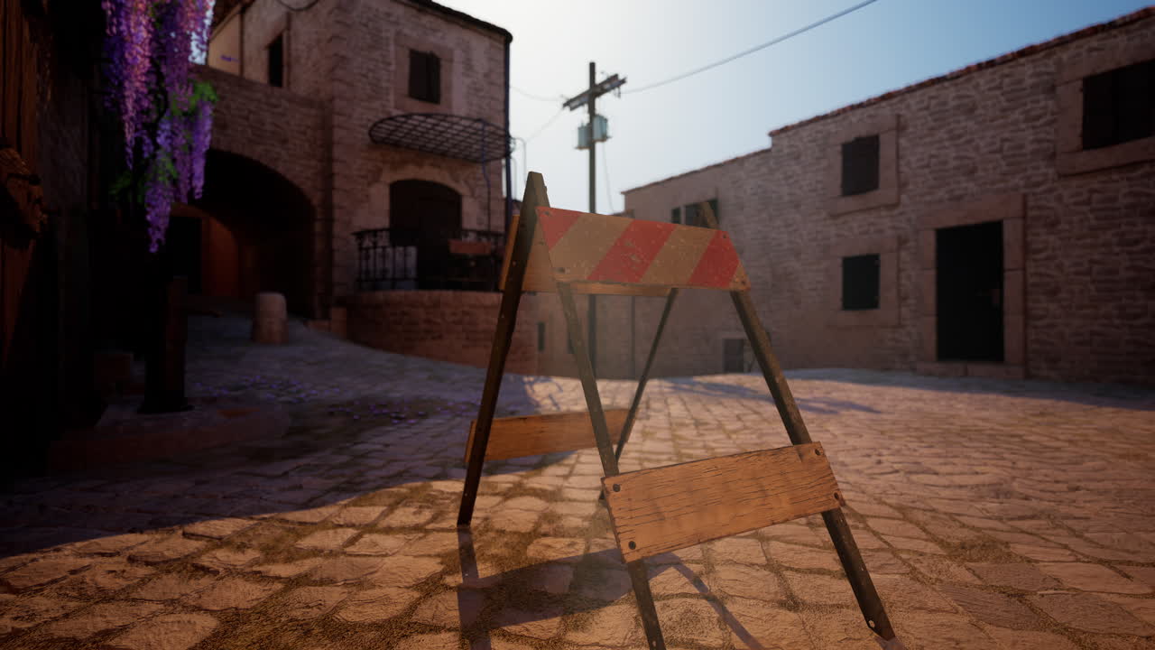 도로가 닫힌 표지판이 있는 중세 마을의 자갈로 된 거리