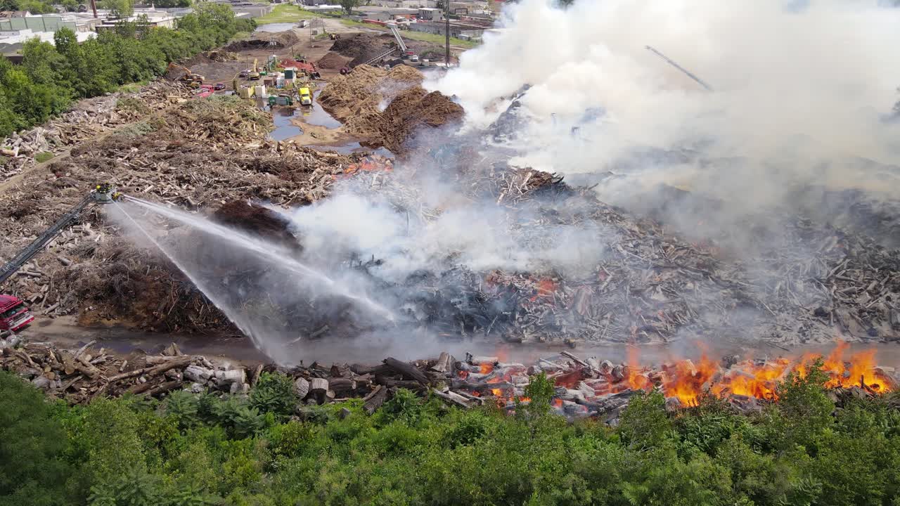 Open flames and smoke of Mulch company in Detroit, USA, aeria lview