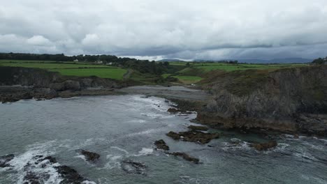 waterford coast ireland before the storm establishing shot of a secluded cove with the comeragh mountains in the background with storm clouds