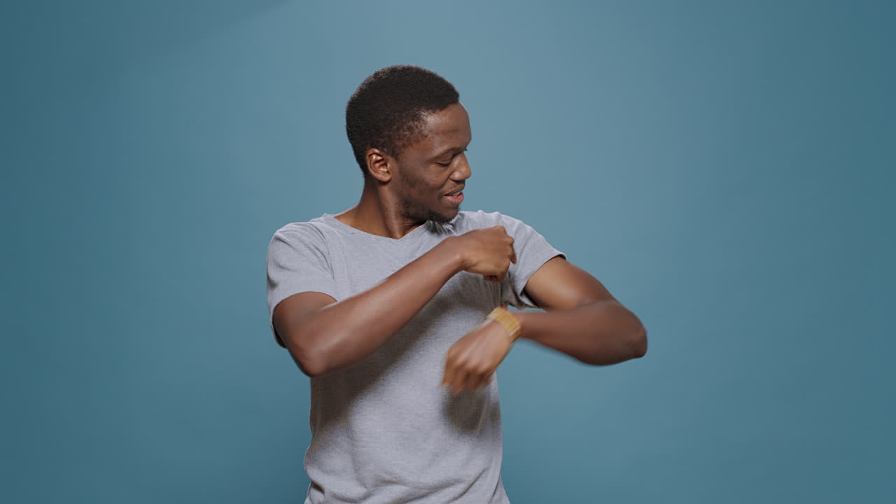 Athletic person flexing biceps and triceps muscles on camera