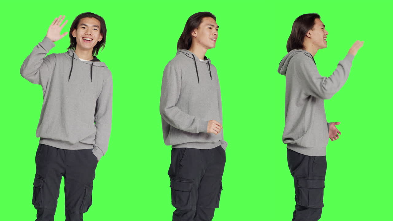 아시아인 남자가 누군가에게 인사합니다.