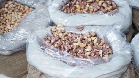 cashews in bags at a market