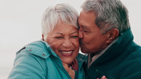 Outdoor-kiss,-face-and-senior-happy-couple