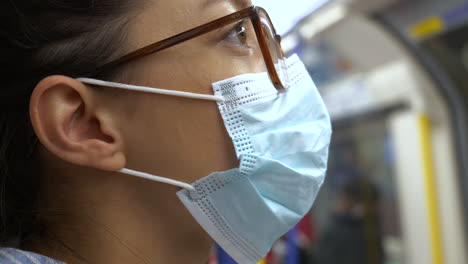 Woman-wearing-a-face-mask-while-on-public-transport