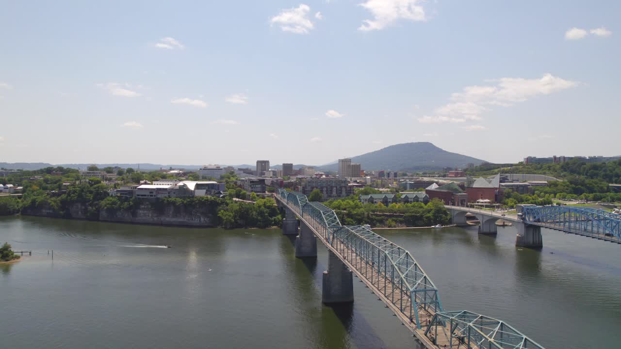 Aerial Drone footage of Chattanooga Tennessee , Drone rising and approaching river and blue bridge