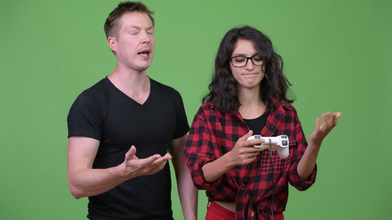 Young couple playing games together