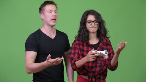 young couple playing games together