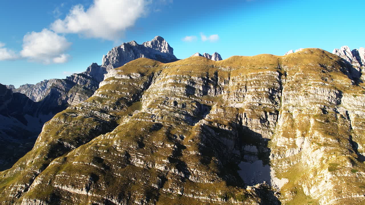 Drone flight over Mountains with Bobotov Kuk, the highest Mountain of Montenegro in the back