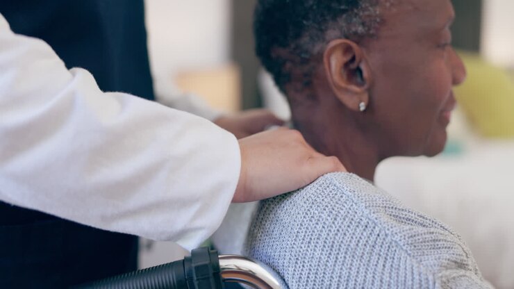 Nurse, shoulder massage and senior woman