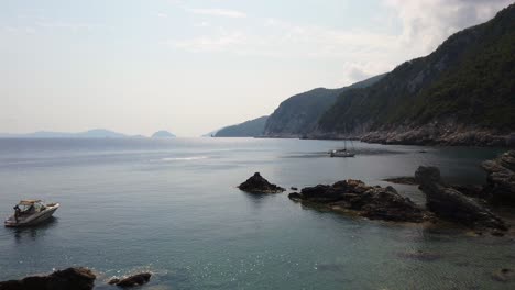 Static-Shot-Of-Boats-In-At-The-Shore-Off-The-Coast-Of-Greece