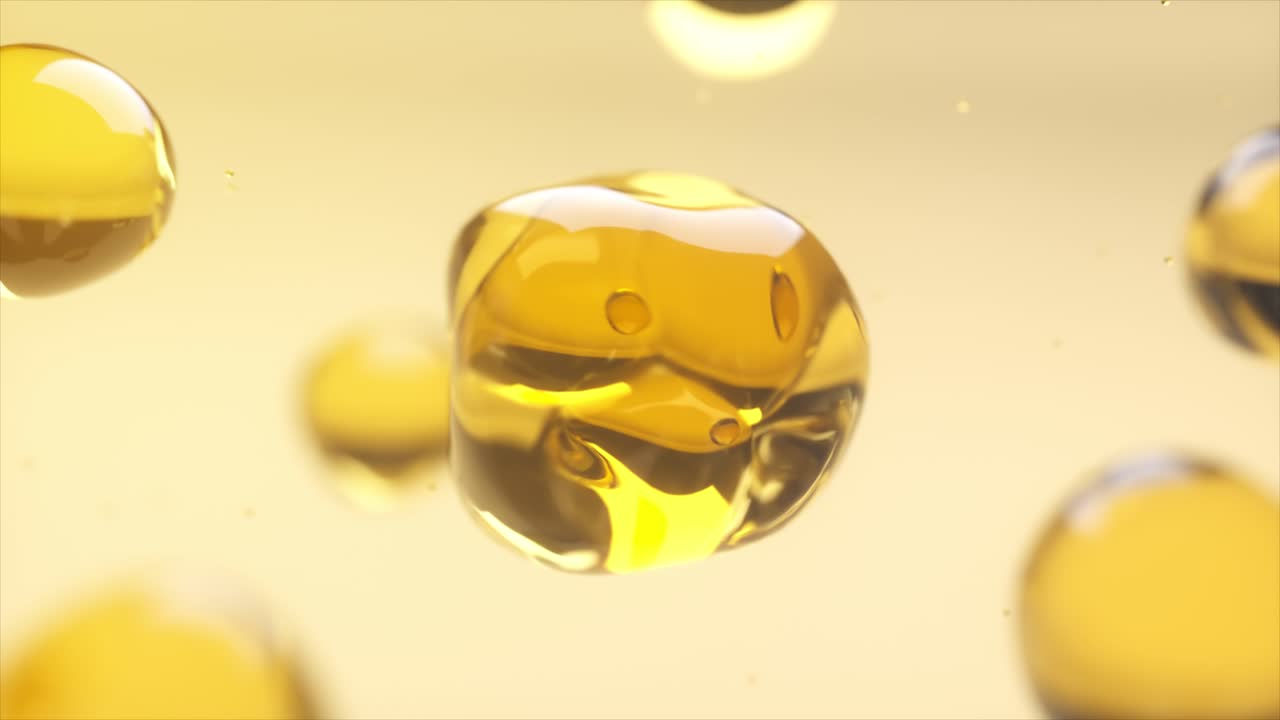 Gocce di Liquido Dorato Astratte