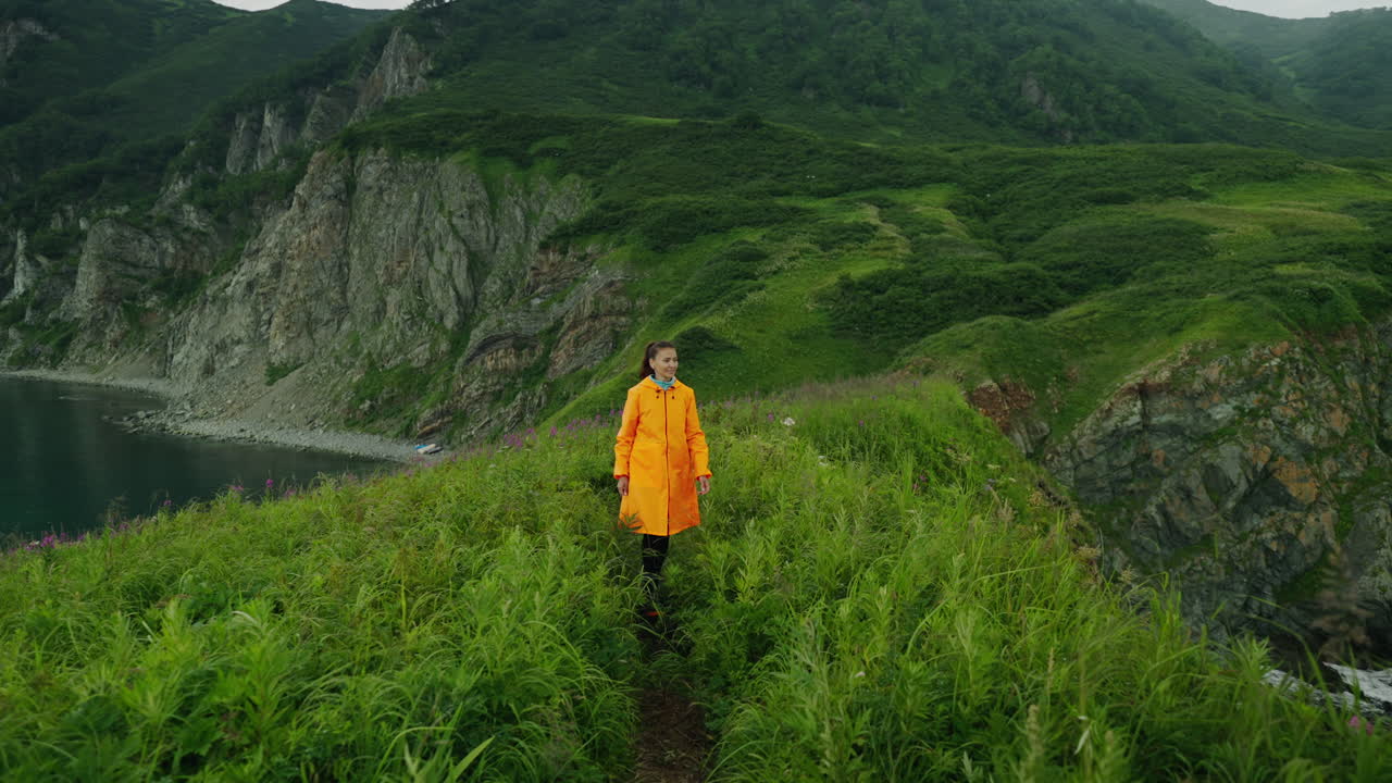 Woman Hiking on a Coastal Trail