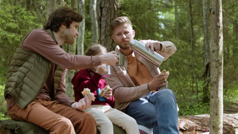 family having picnic at the forest