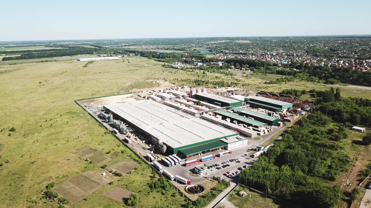 location of the production facilities of the plant for the manufacturing of a parquet board outside the city. Aerial view