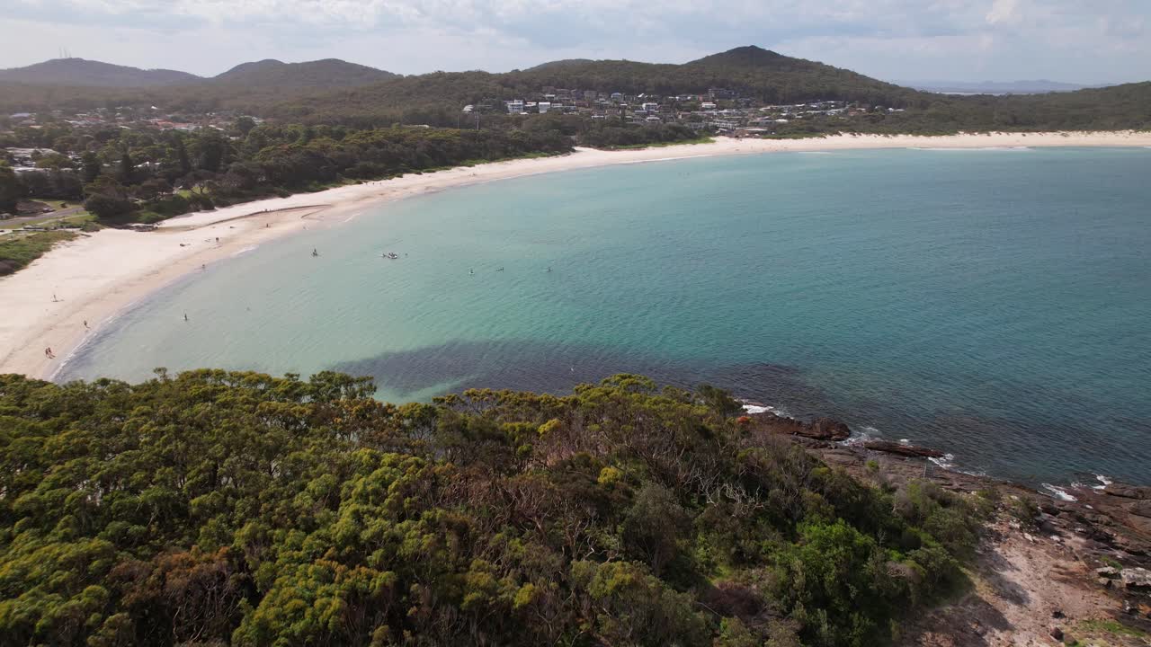 Fingal Bay With White Sand Beach In Summer. Barry Park Lookout Revealed. NSW, Australia. aerial pullback shot