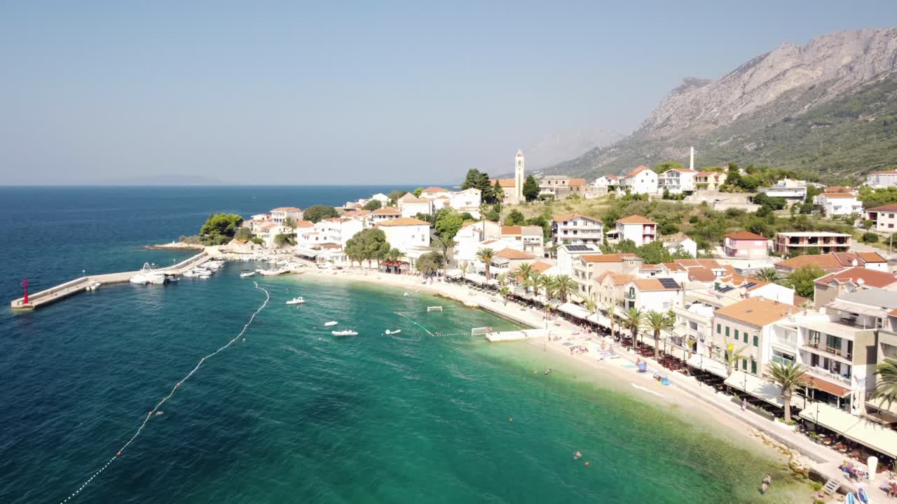 Scenic Coastal Town Of Gradac Down The Biokovo Mountain Range And The Adriatic Sea, Croatia. Aerial Shot