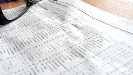 Newspaper stocks and shares page.