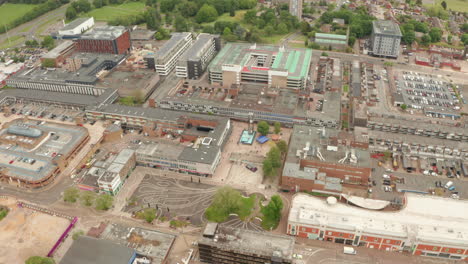 Circling-aerial-shot-around-Stevenage-town-square-clock-tower