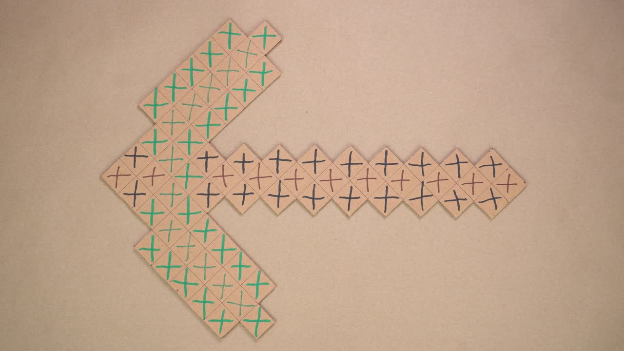 Hand crafts with cardboard on table, creative and focused activity