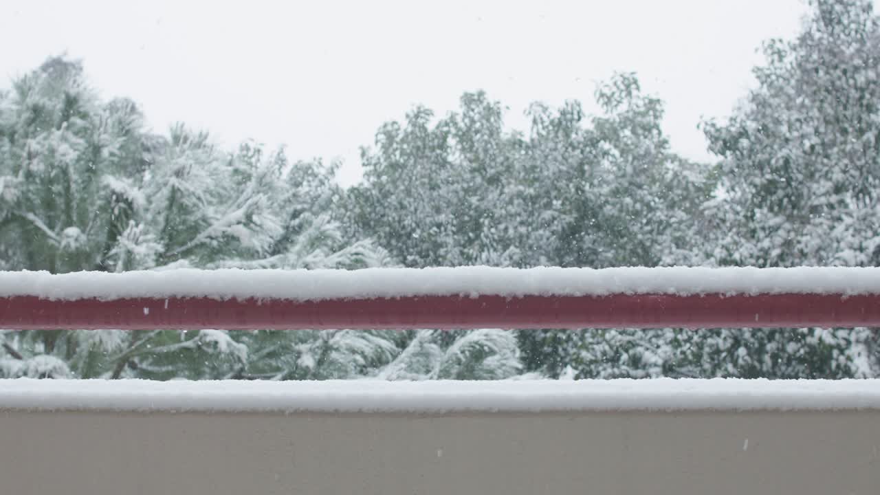 Balcony's wall and railing in snowy weather
