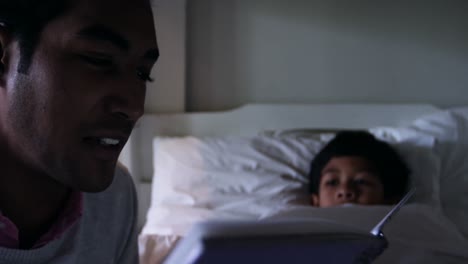 Father-and-son-reading-book