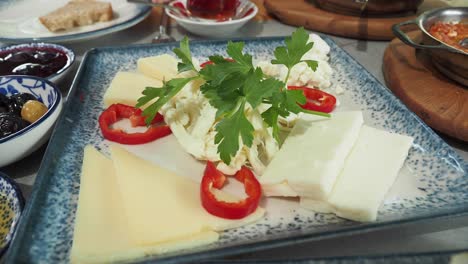 turkish breakfast plate with assorted cheeses and parsley