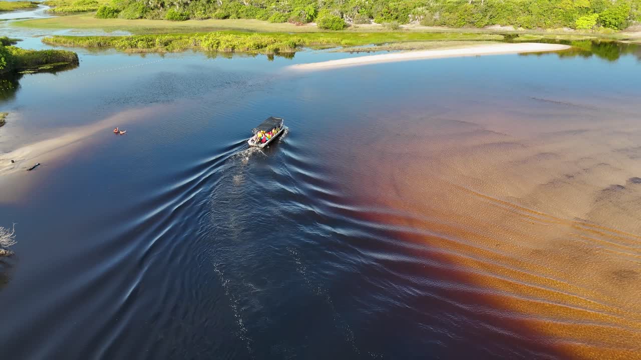 Boat Sailing At Santo Amaro In Maranhao Brazil. Nature Landscape. Beautiful Rainforest. Boat Sailing In Maranhao. Mangrove Scenery. Colored River. Native Village. Brazil Northeast