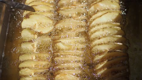 spiral fried potatoes in hot oil