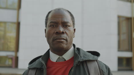 close-up portrait of an african american man looking at camera