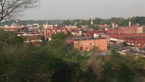 Camera-Pansright-For-A-View-Of-Buildings-And-A-Traffic-Bridge-In-A-Small-Mountain-Town