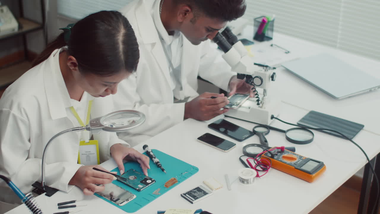 Technicians Working at Repair Center