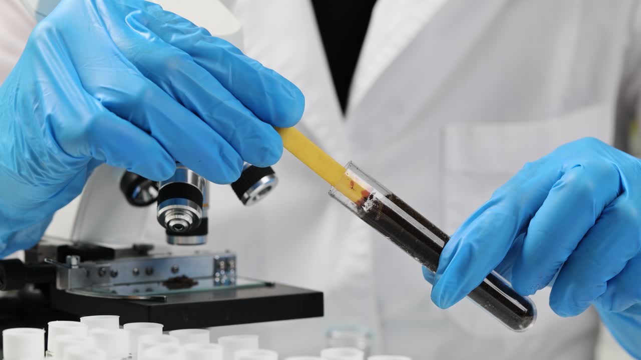 Scientist conducting soil analysis in a laboratory