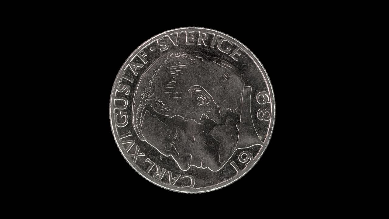 Sweden 1989 1 krona coin obverse with stylized profile portrait of King Carl XVI Gustaf rotating on black background