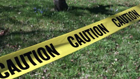 warning for caution written on yellow ribbon