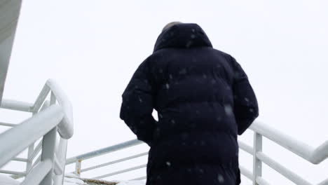 lonely man going up on stairs