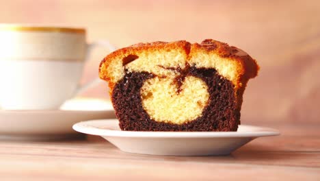 slice of swirl cake with coffee