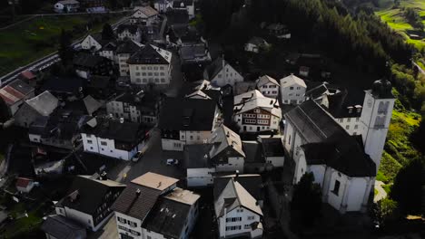 aerial: hospental town close to gotthard pass in the swiss alps