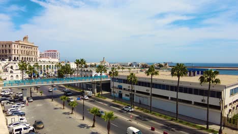 sunny day at the seafront of algiers the capital of algeria with the port in the background