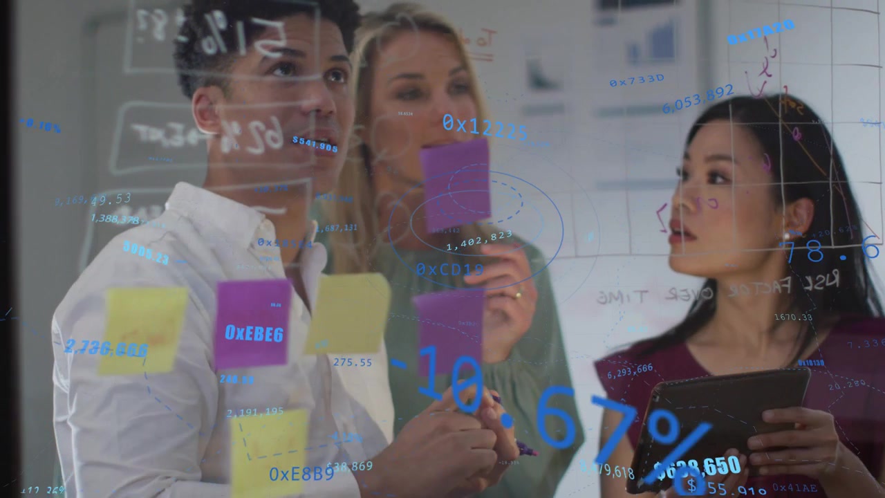 Team reacting to tablet data overlay, placing purple and yellow sticky notes for product planning
