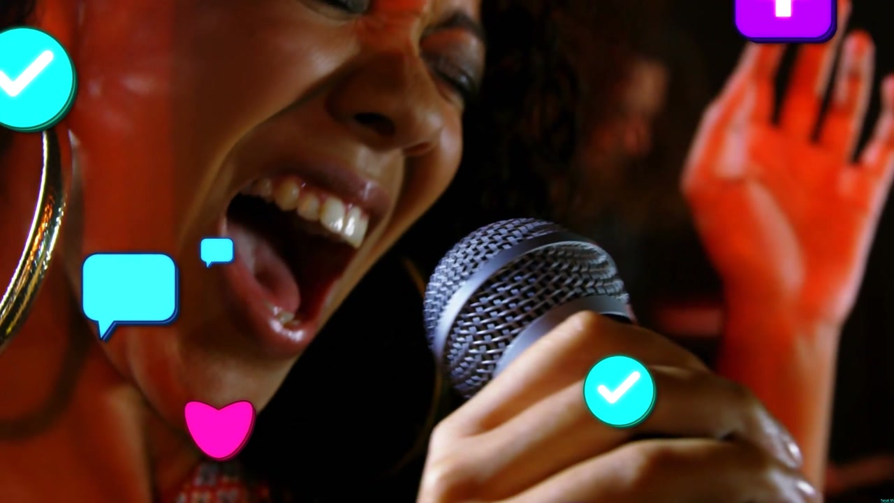 Female singer singing louder on stage mic, causing hearts chats growing, obscuring for social buzz