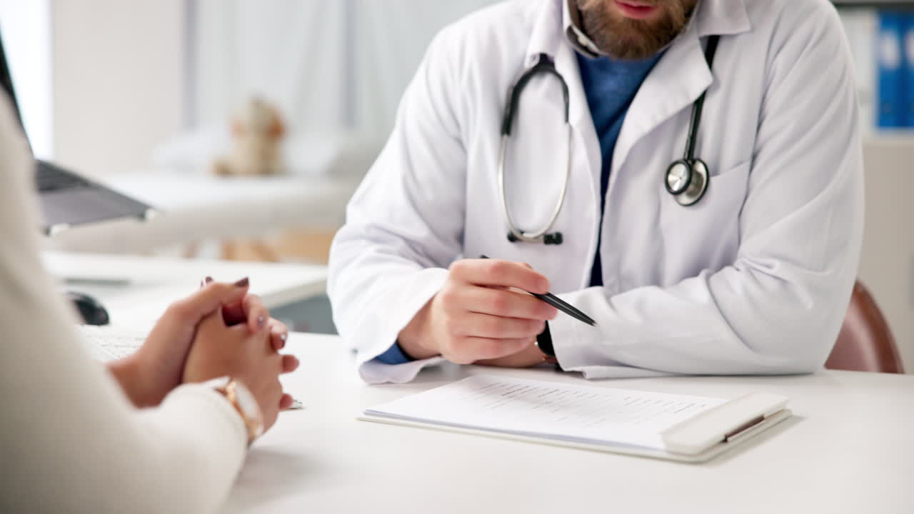 Doctor consulting with patient in office