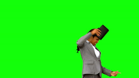 Angry-businesswoman-throwing-her-agenda-on-green-screen