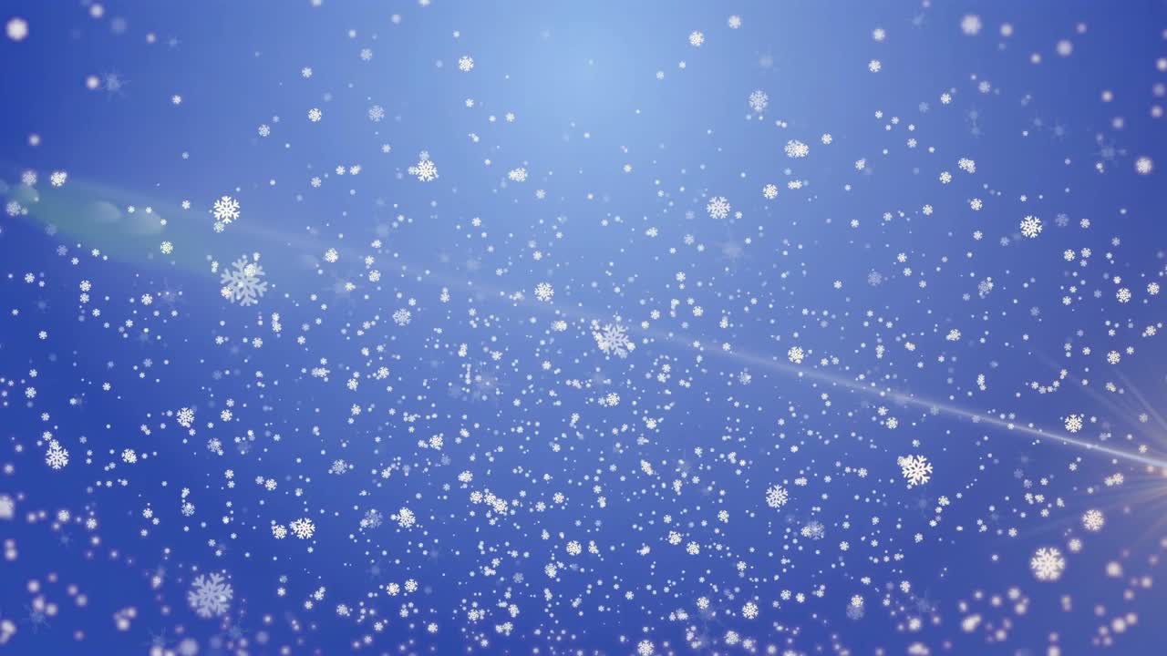 Blue gradient opening causing drifting snowflakes thickening with flare creating wintery backdrop