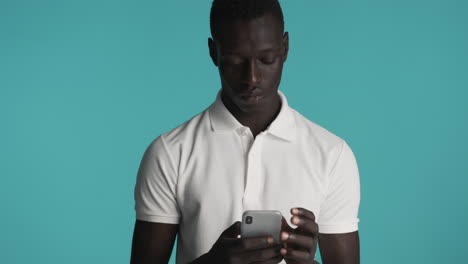 african american man on blue background.